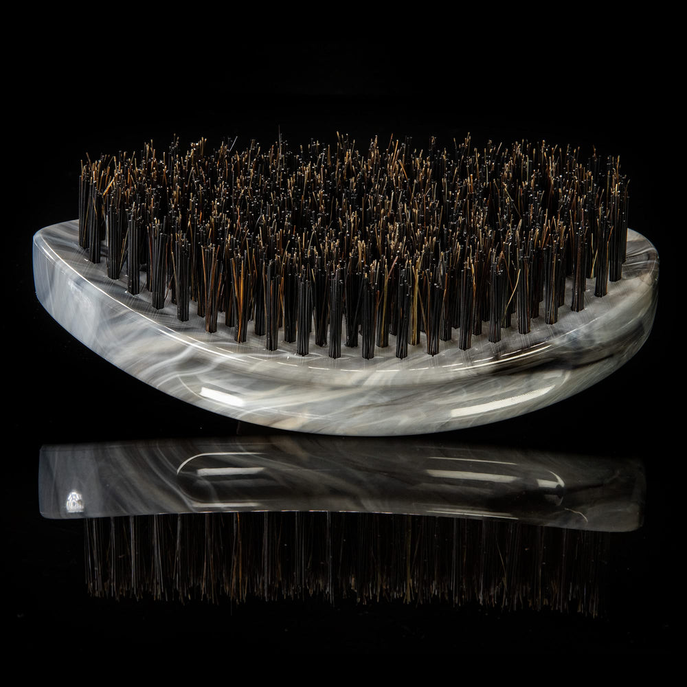 Torino Pro Curve brush in use on waves demonstrates efficient reach across crown.