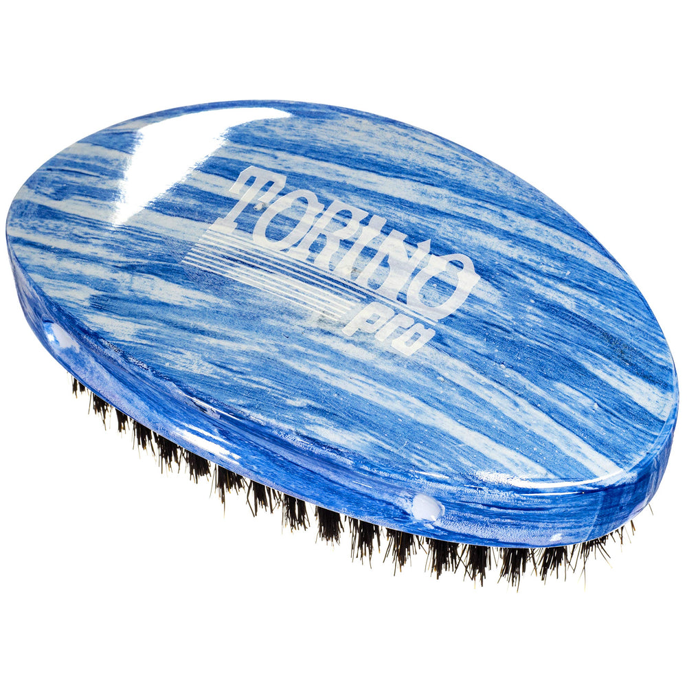 Torino Pro Curve Palm Medium Wave Brush 19 closeup showing curved palm fit for precision