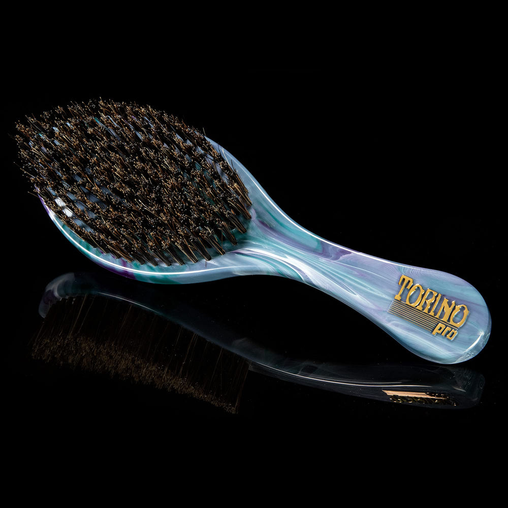 Torino Pro Curve Wave Brush 201 curve design emphasizes reach around the crown during wolfing.