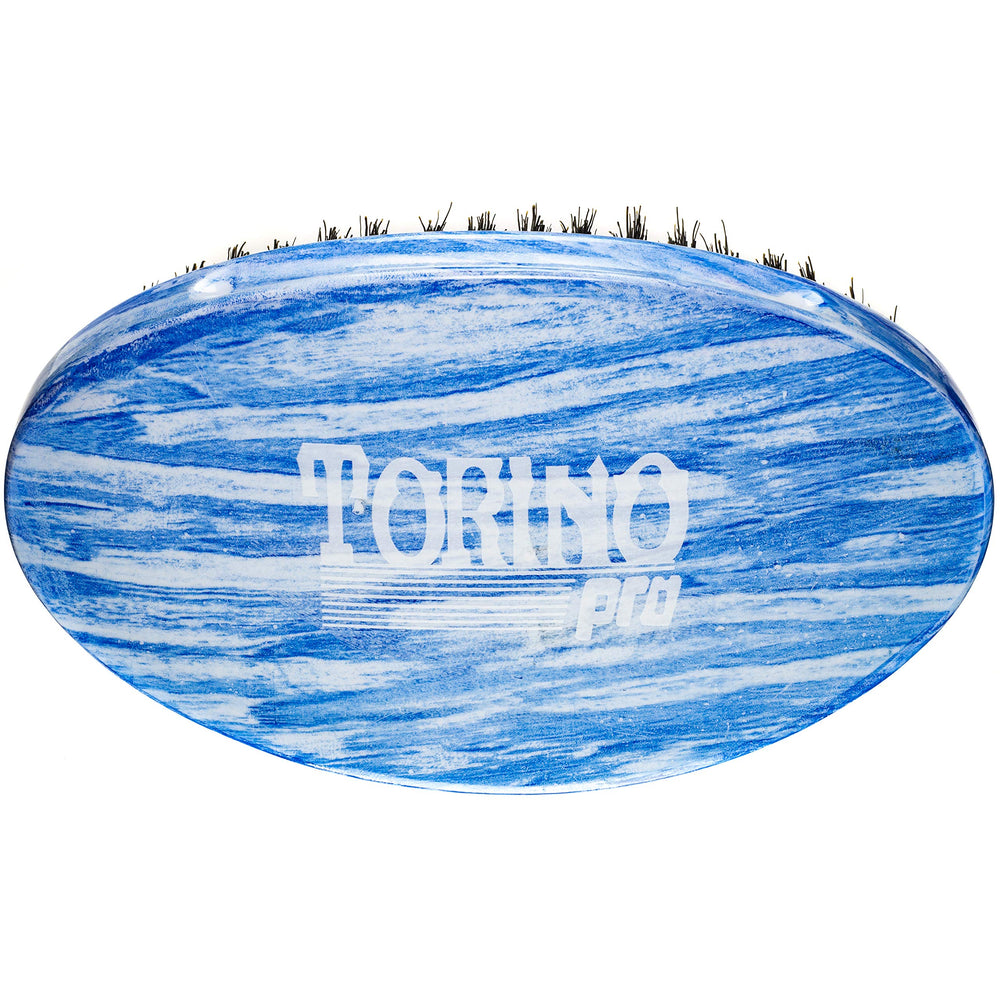 Torino Pro Maintenance Card insert explains bristle shedding and care tips