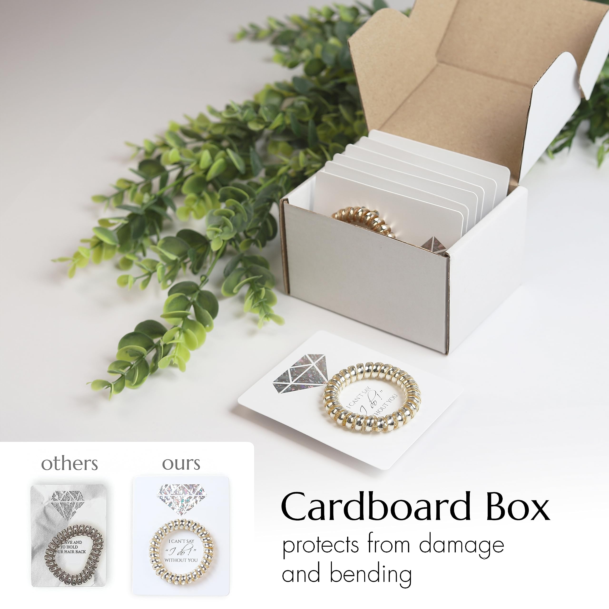 Toros bridesmaid-favors bridal-shower display featuring silver spiral hair ties.