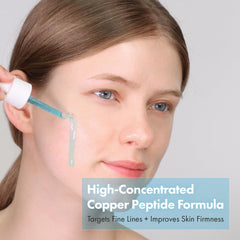 Tosowoong Copper Peptide Serum dropper releases a silky firming solution.