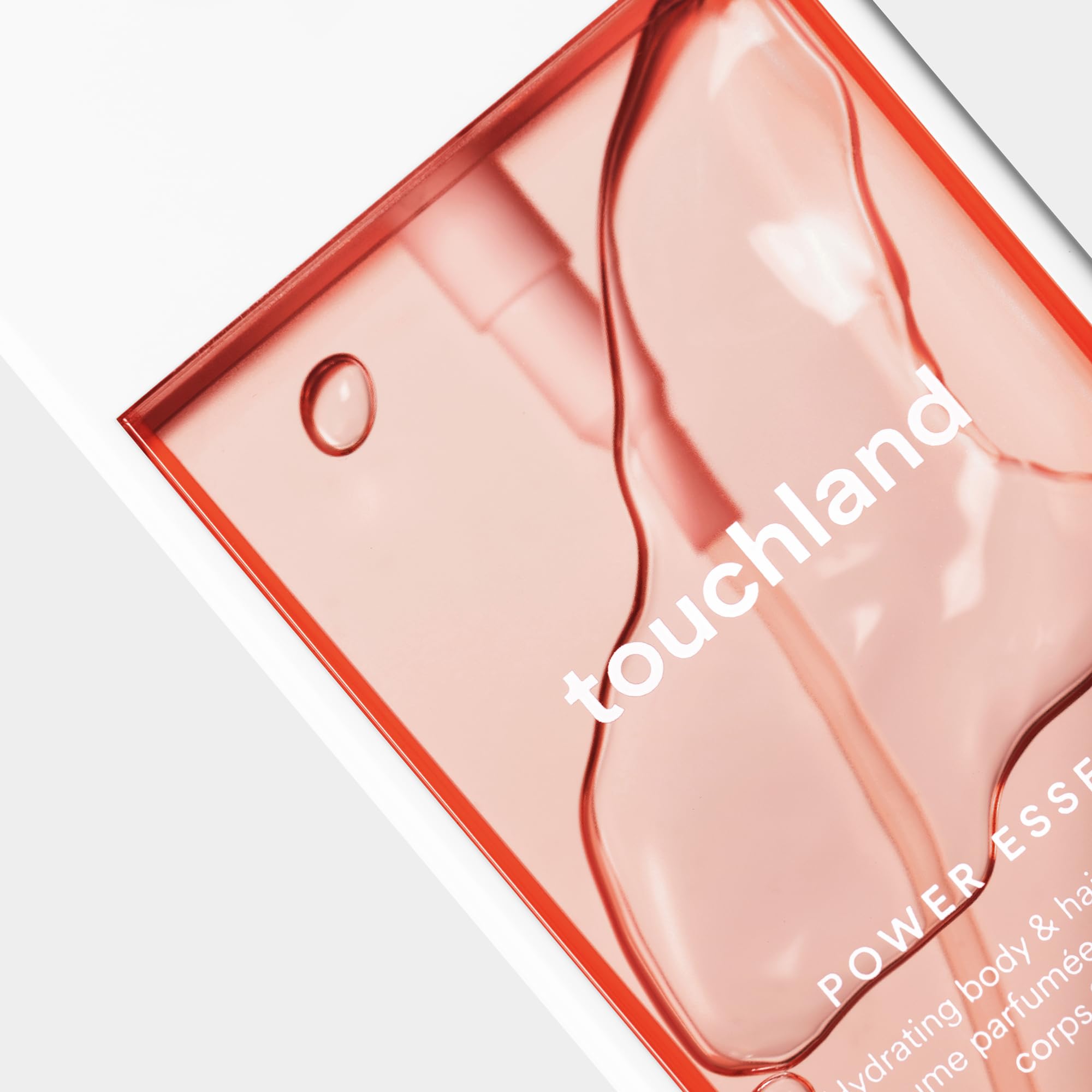Touchland layering two mists to create a personalized scent.