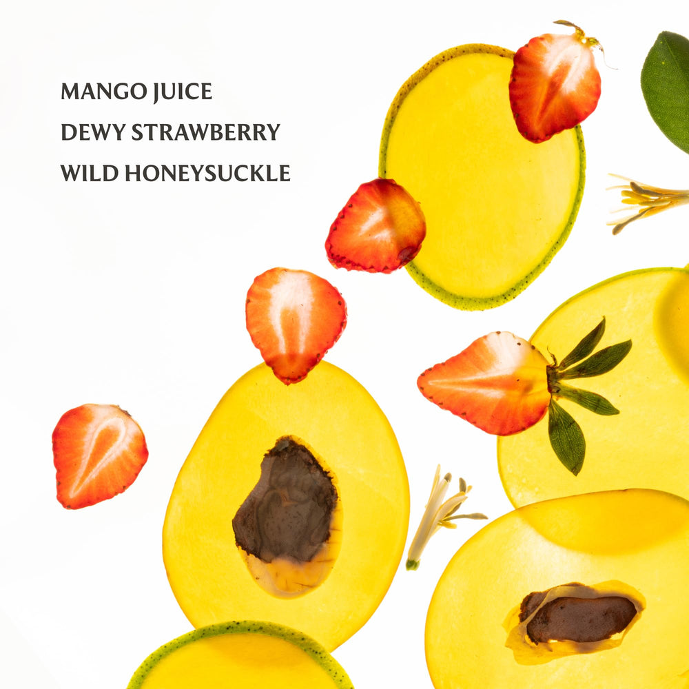 Touchland Mango Mojo capless design spray enabling quick on-the-go fragrance refresh
