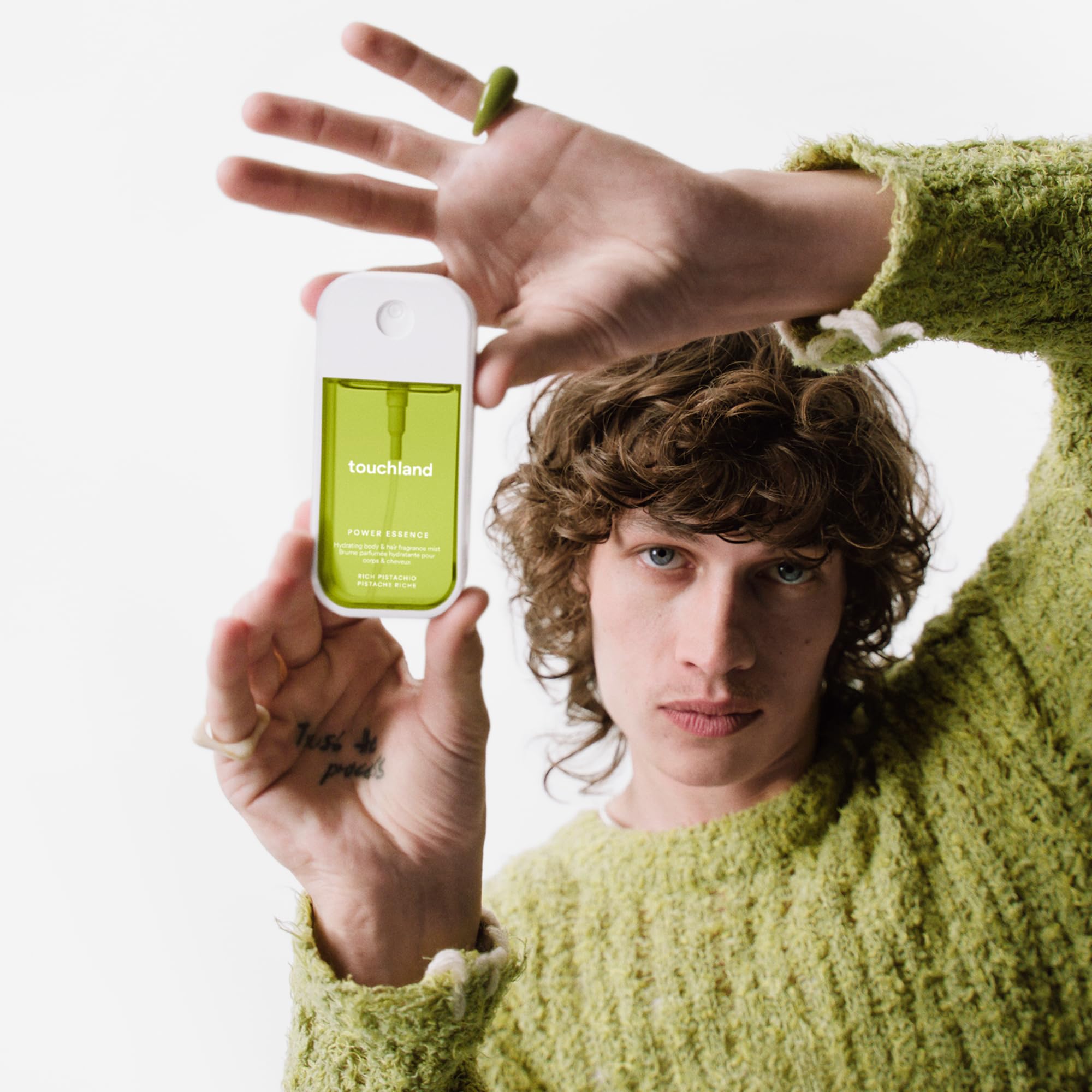 Touchland Rich Pistachio travel-capless design for compact carry.
