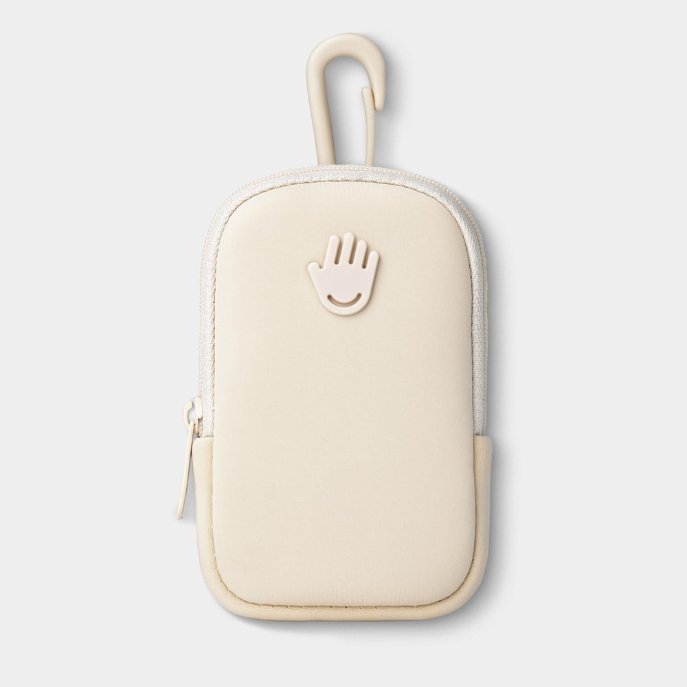 Touchland Touchette pouch Ivory attached to belt loop for on-the-go convenience.