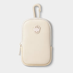 Touchland Touchette pouch Ivory attached to belt loop for on-the-go convenience.