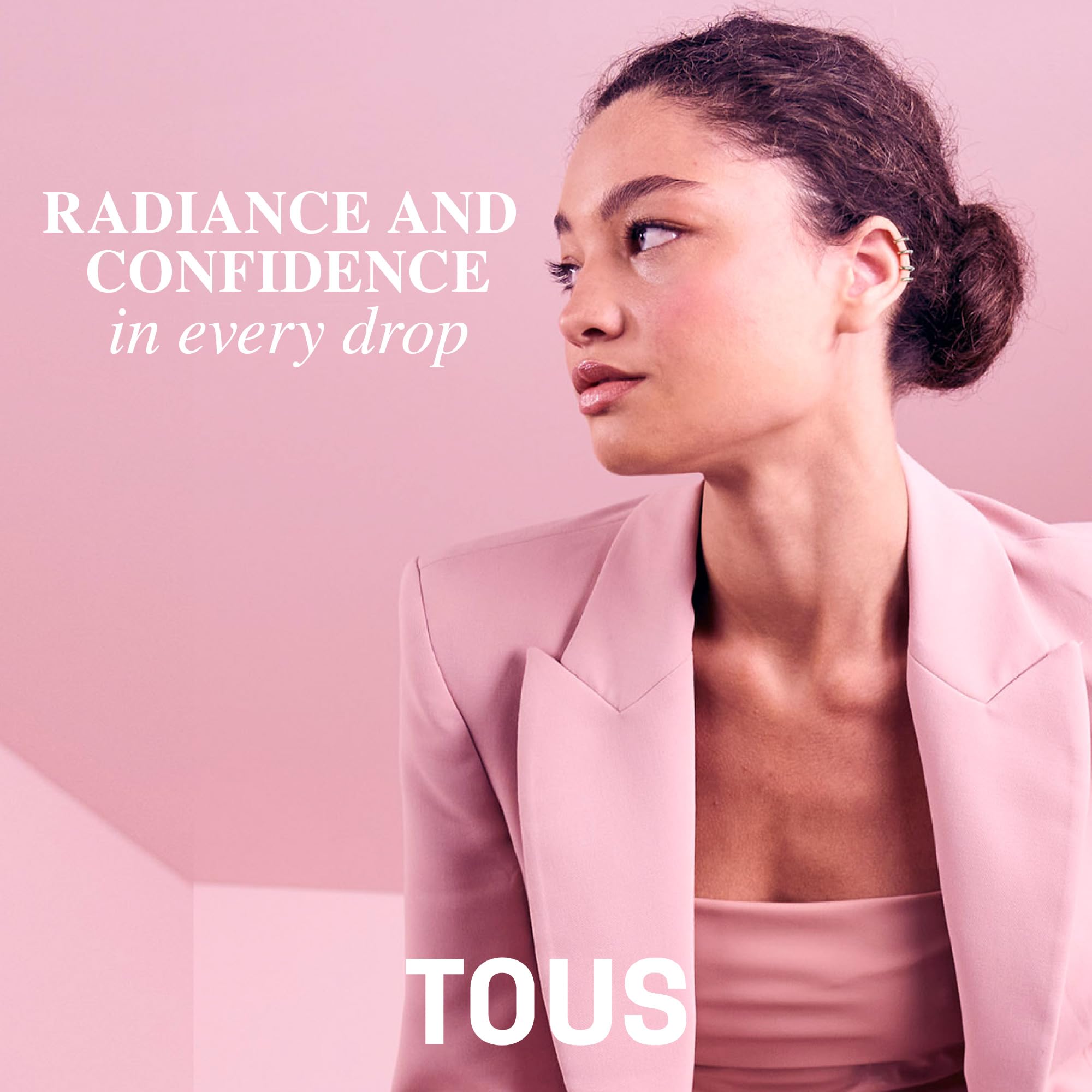 TOUS woody-amber base image conveys lasting warmth and everyday confidence