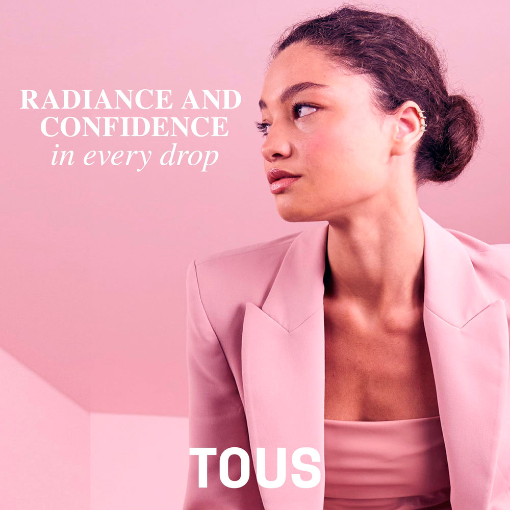 TOUS woody-amber base image conveys lasting warmth and everyday confidence