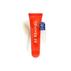 Tower 28 LipSoftie jar close-up showing creamy lip-care texture.