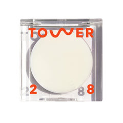 Tower 28 SuperDew Balm compact showing creamy glow for quick highlighting.