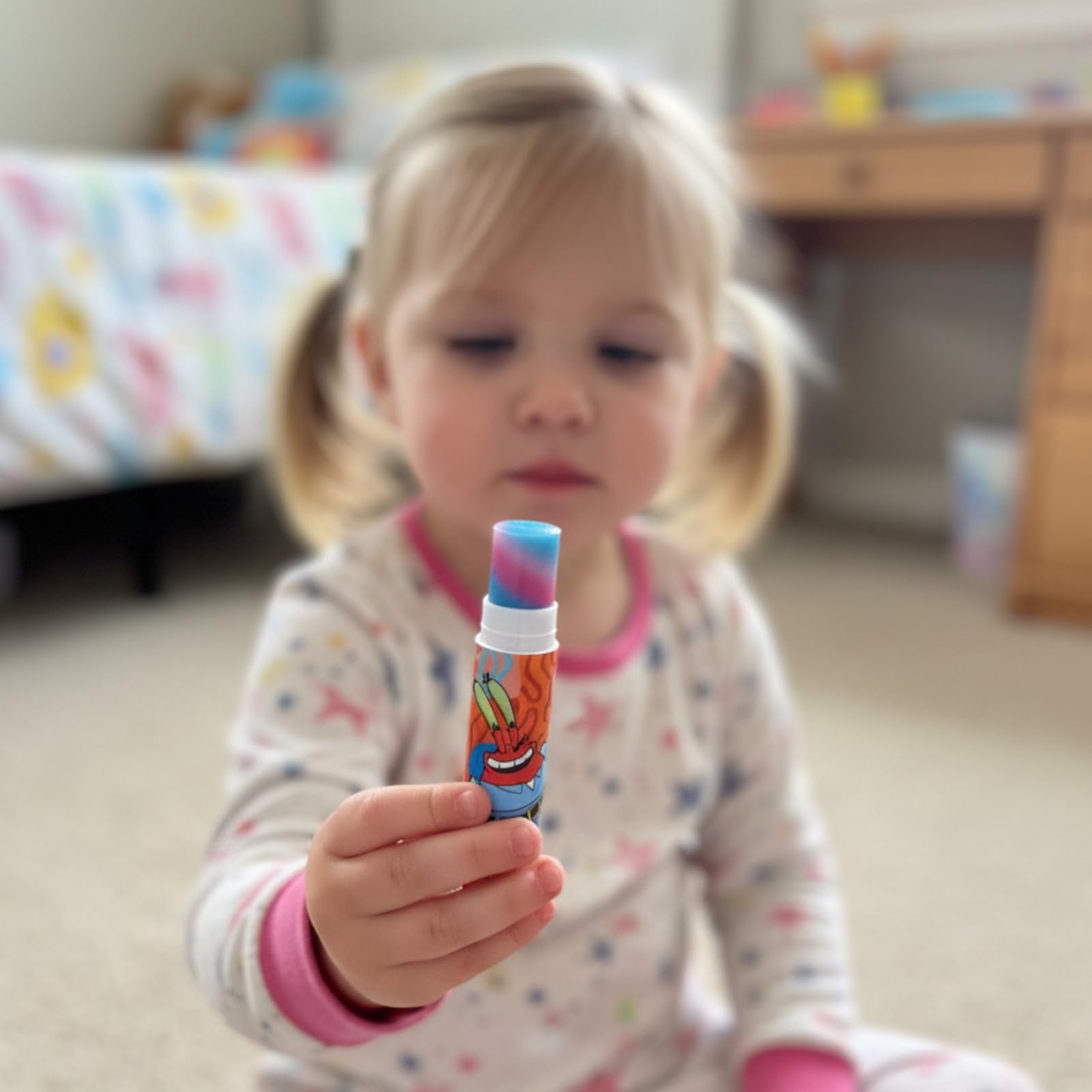 Townley Girl SpongeBob lipbalm on kid-application scene demonstrates easy, kid-friendly use.