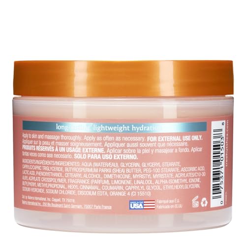 Applying Tree Hut Vitamin C Whipped Shea Butter to the arm for quick hydration.