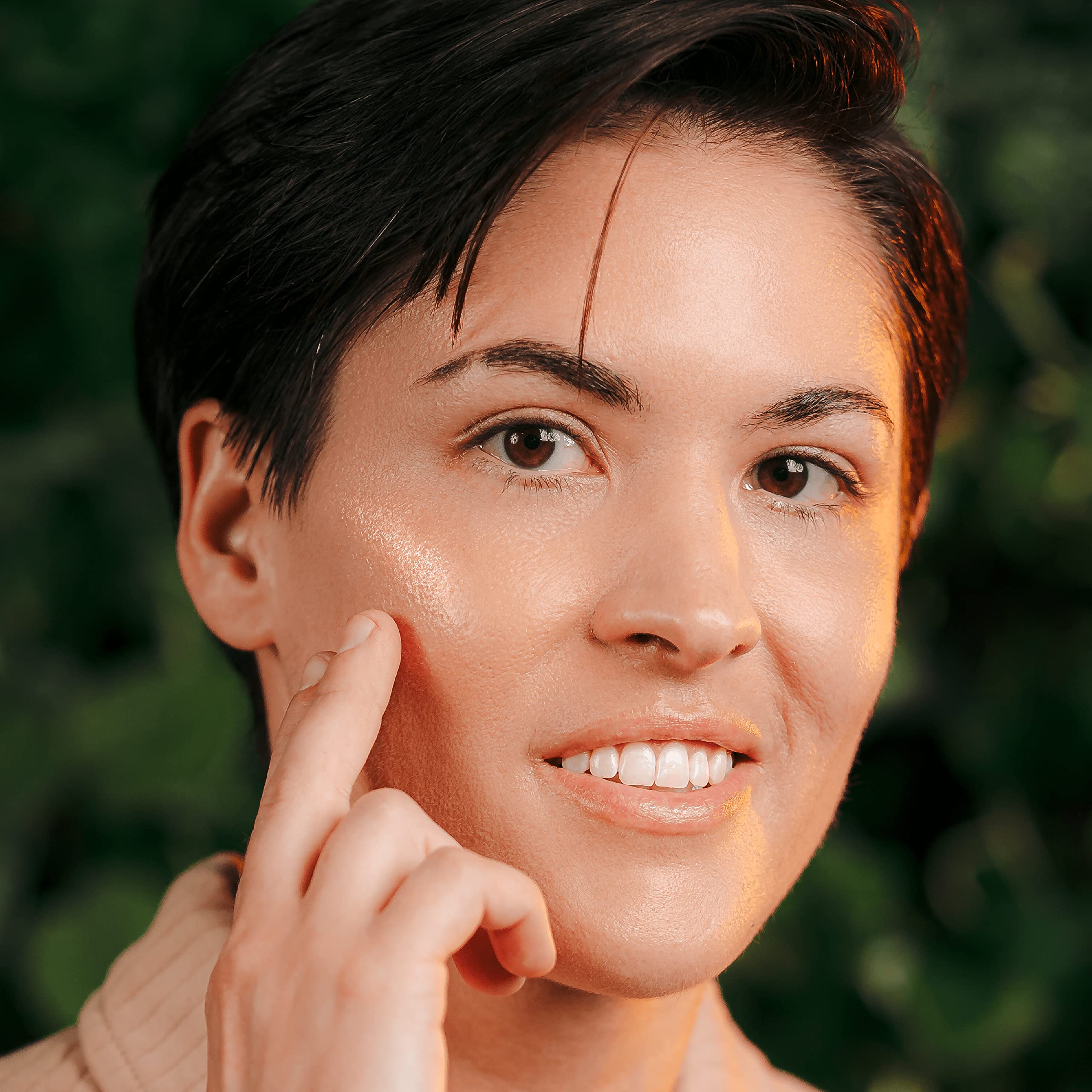 Tree of Life Beauty application drops on fingertips showing easy step-by-step regimen