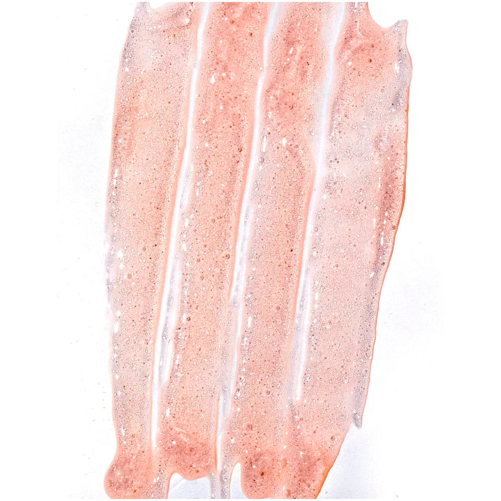 Tree Hut Pineapple & Papaya Face Scrub application on skin demonstrates refreshing cleanse.
