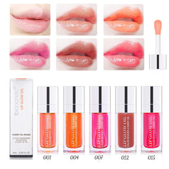 TrendyNow Rosewood Lip Glow Oil being applied highlights moisturizing feel and subtle color.