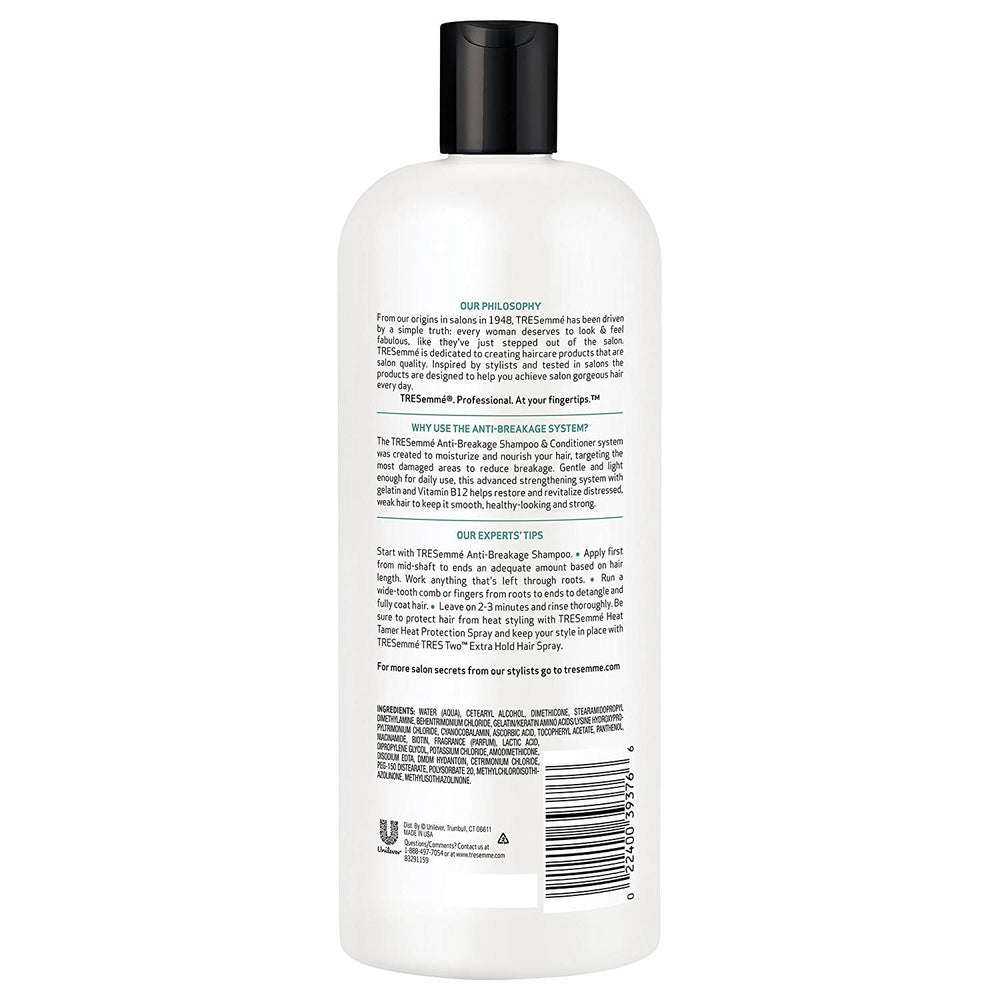 Tresemme conditioner texture close-up showing rich detangling moisture.