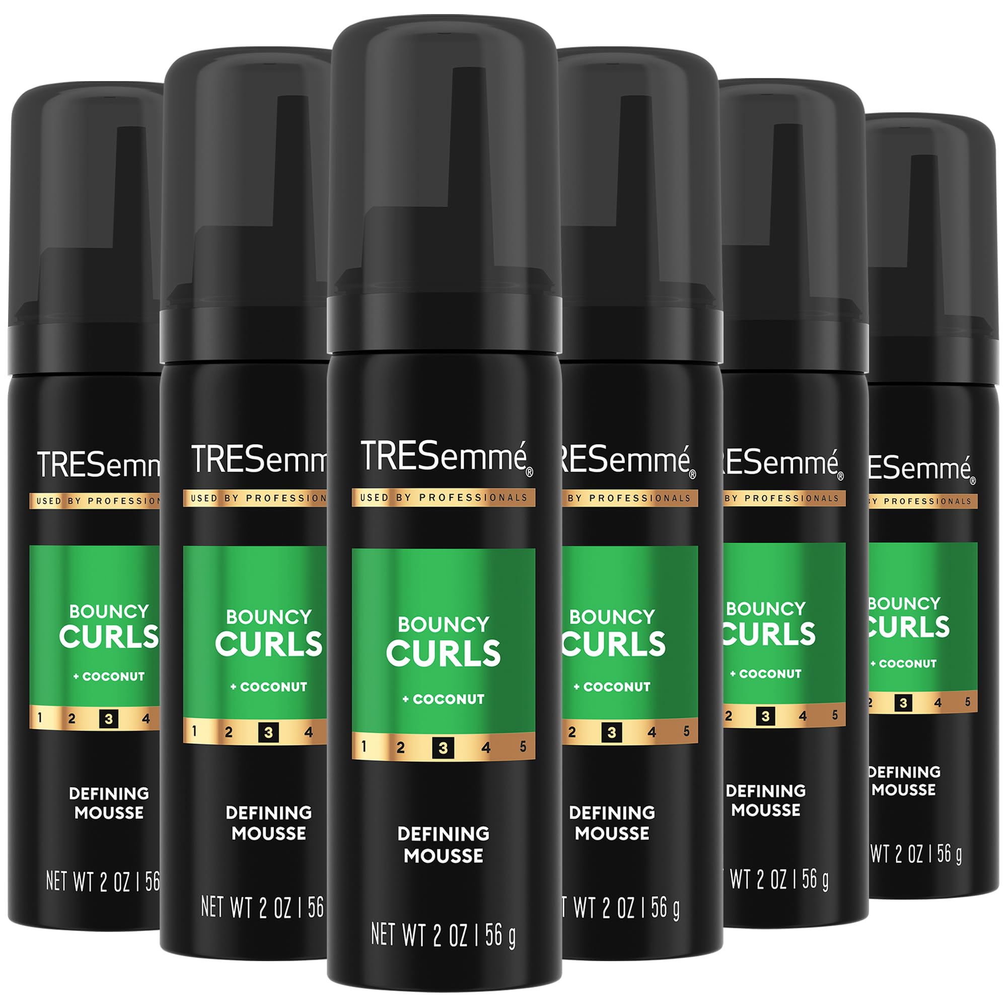 TRESemmé Defining Hair Mousse bottle front showcases defined curls.
