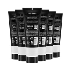 TRESemmé Extra Hold Gel on damp hair being prepared for styling