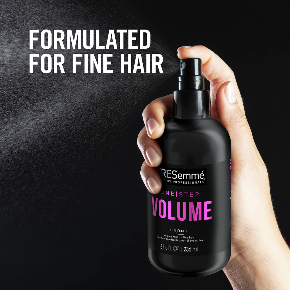 TRESemmé Volume Mist on damp hair for even spray and volume.