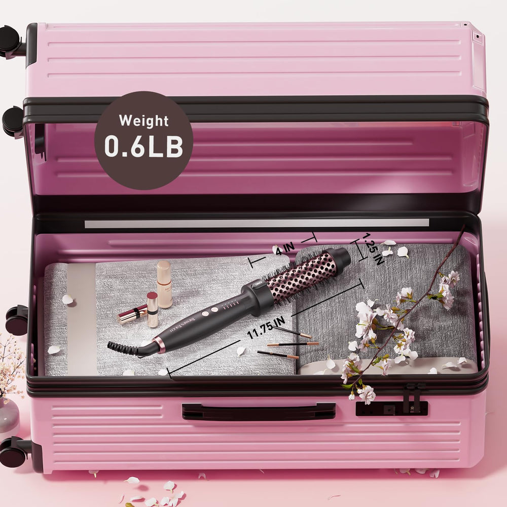 Rose gold finish on the Tresses Touch Thermal Brush ideal for travel-ready styling.