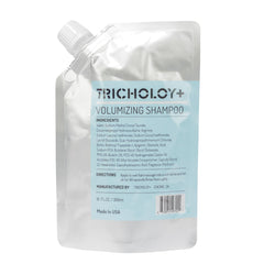 Tricholoy+ volumizing shampoo bottle closeup highlighting root lift for fine hair.