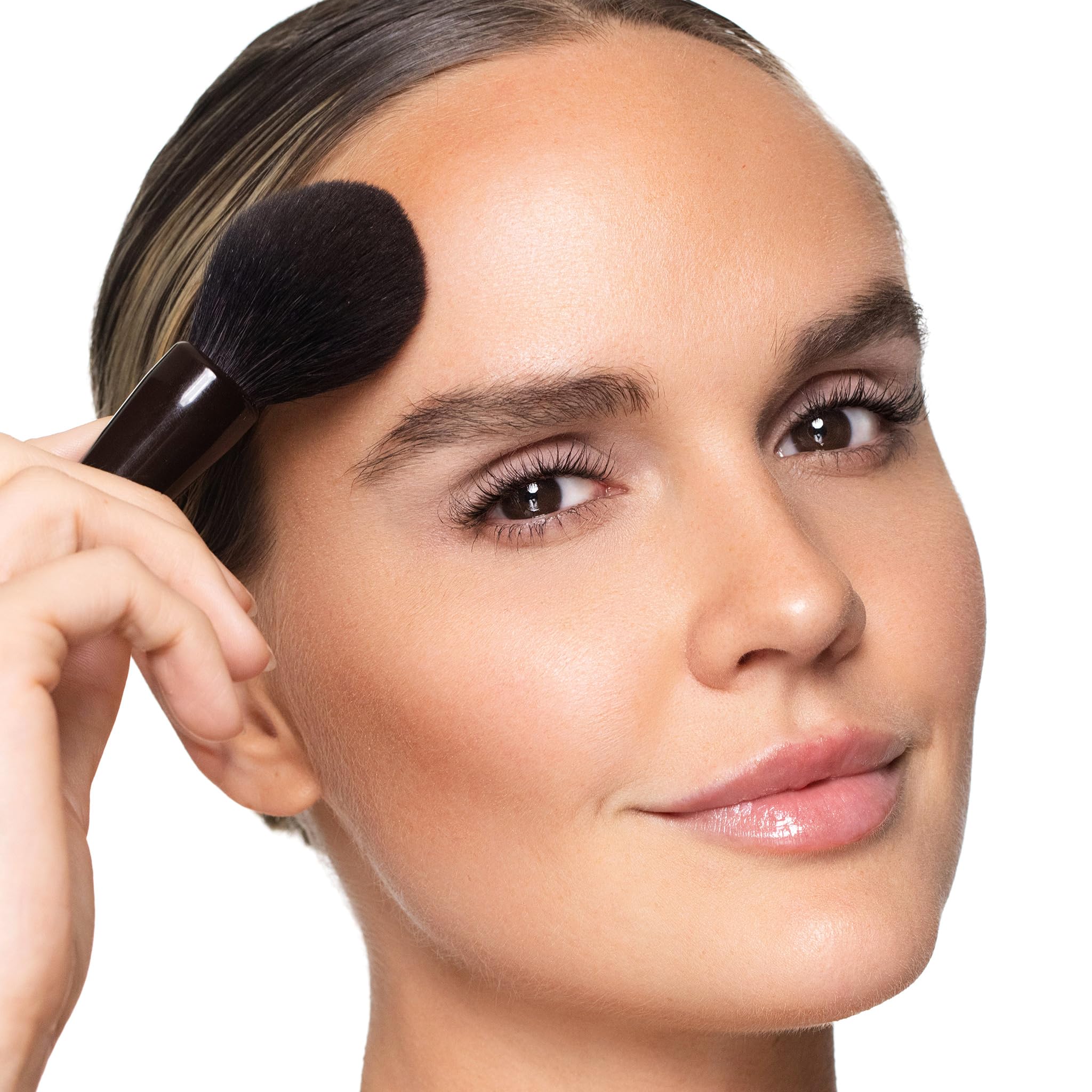 Trish McEvoy Dual Resort Bronzer Refill deep shade swatch—define features with contour.