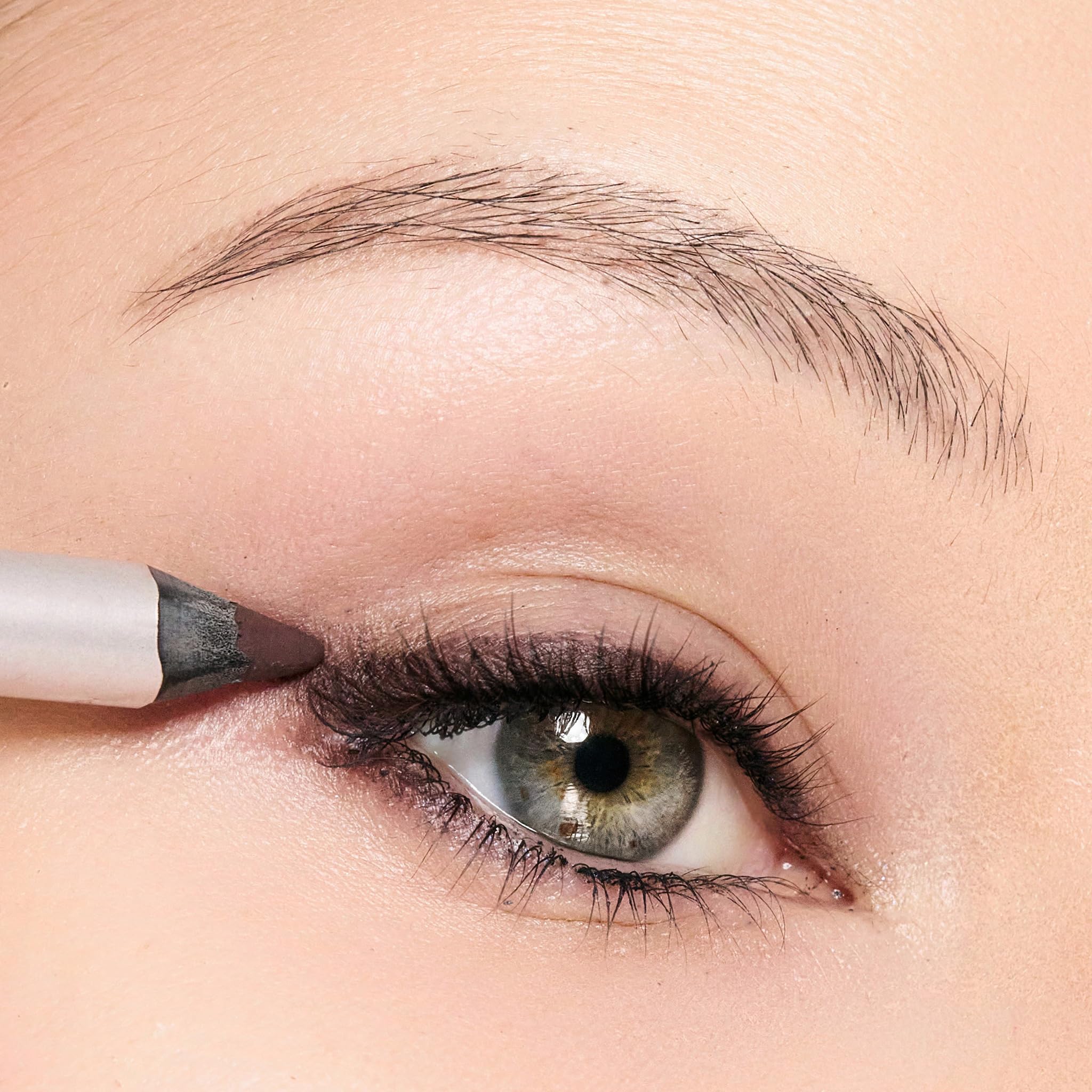 Trish McEvoy Deep Aubergine lash-line application demonstrates waterproof formula staying put from day to night.