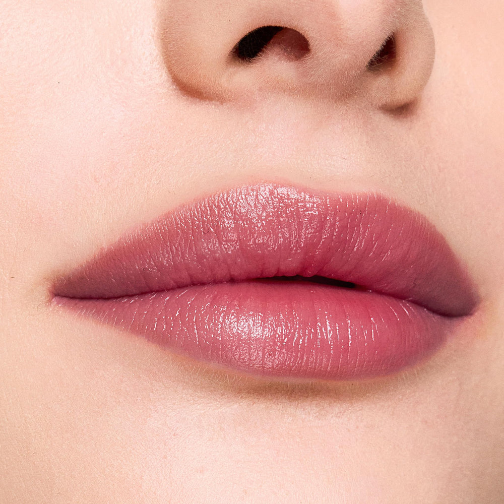 Trish McEvoy Sheer Lip Color on bare lips with glossy hydration