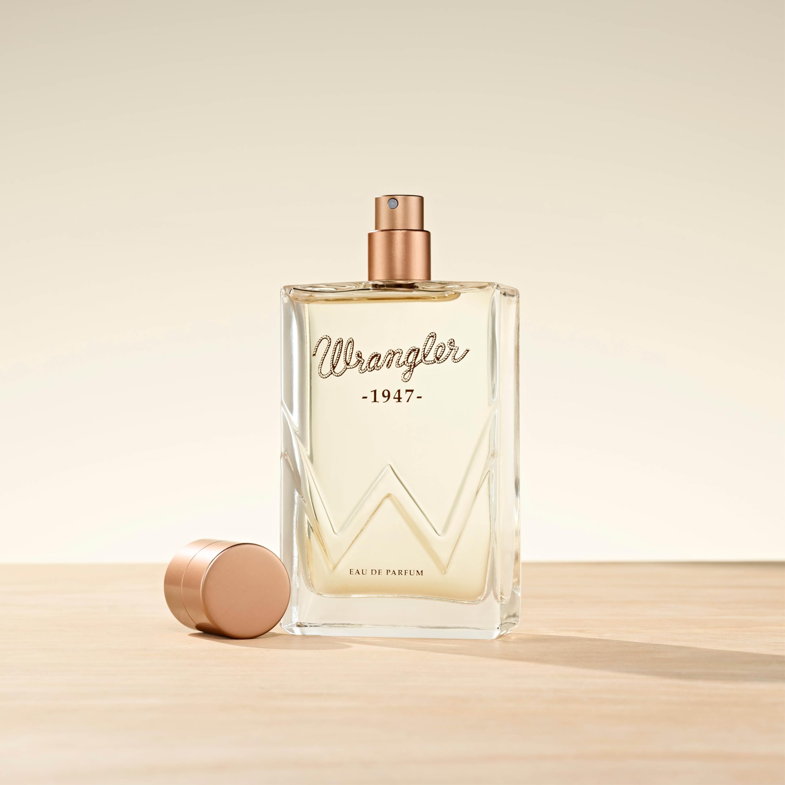 Wrangler 1947 cap detail – vintage-inspired hardware signals premium quality and refined scent.