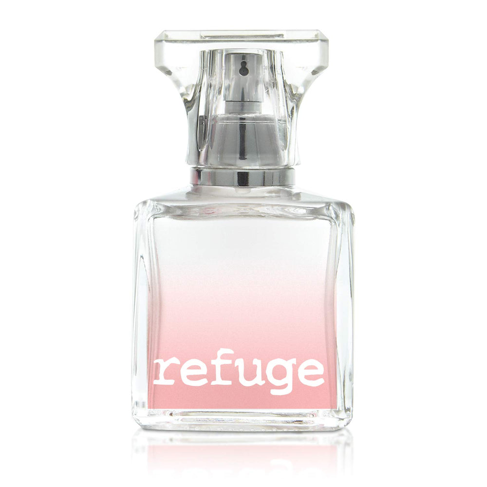 Charlotte Russe Refuge open bottle highlights spray nozzle for easy daily application.