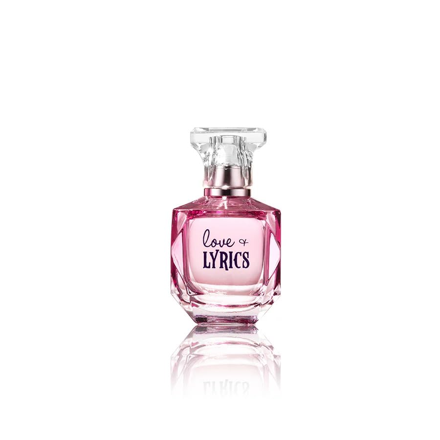 Tru Fragrance Love and Lyrics applying perfume to wrist for everyday use