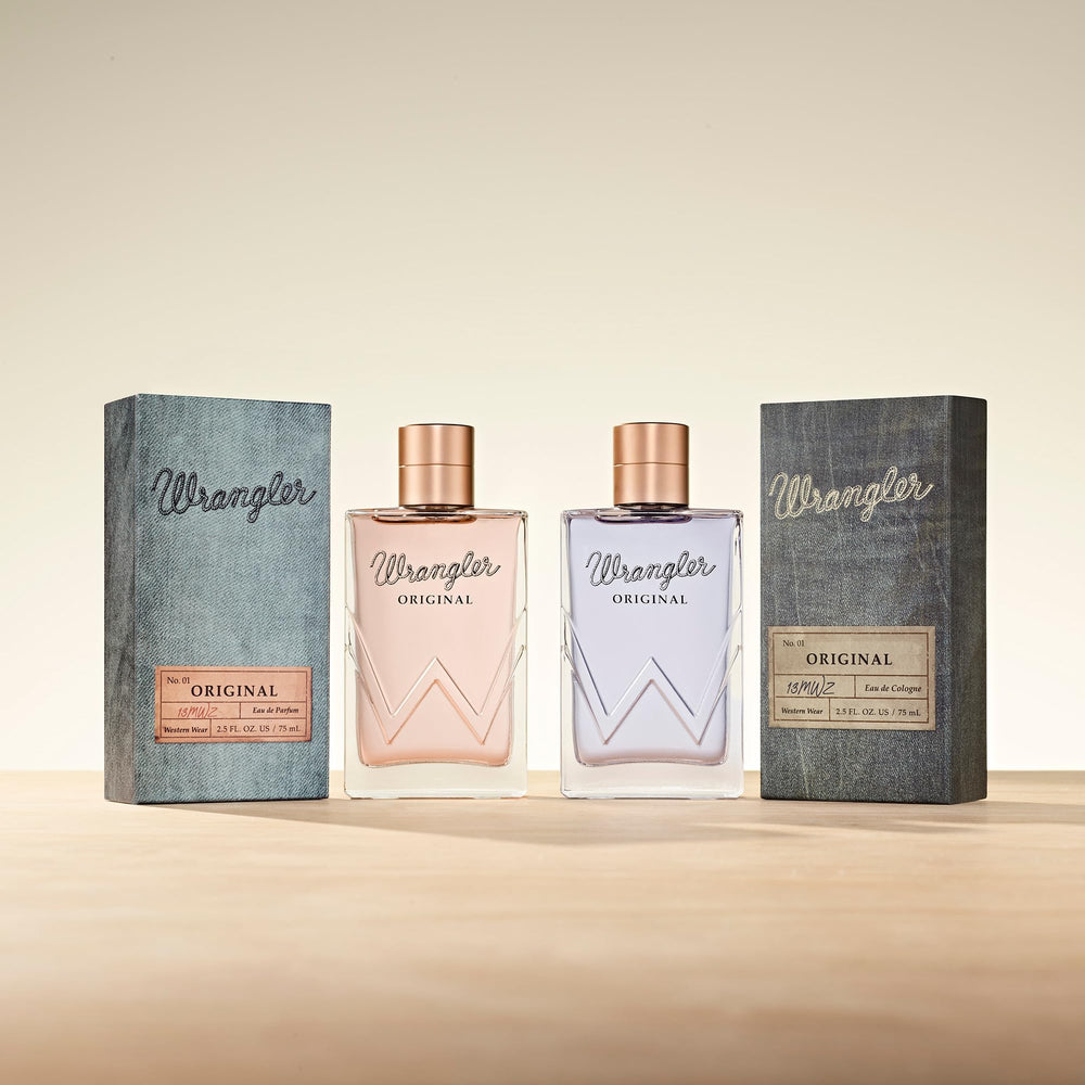 Tru Fragrance Beauty Wrangler Original bottle on wood surface emphasizes rustic-cowgirl aesthetic.