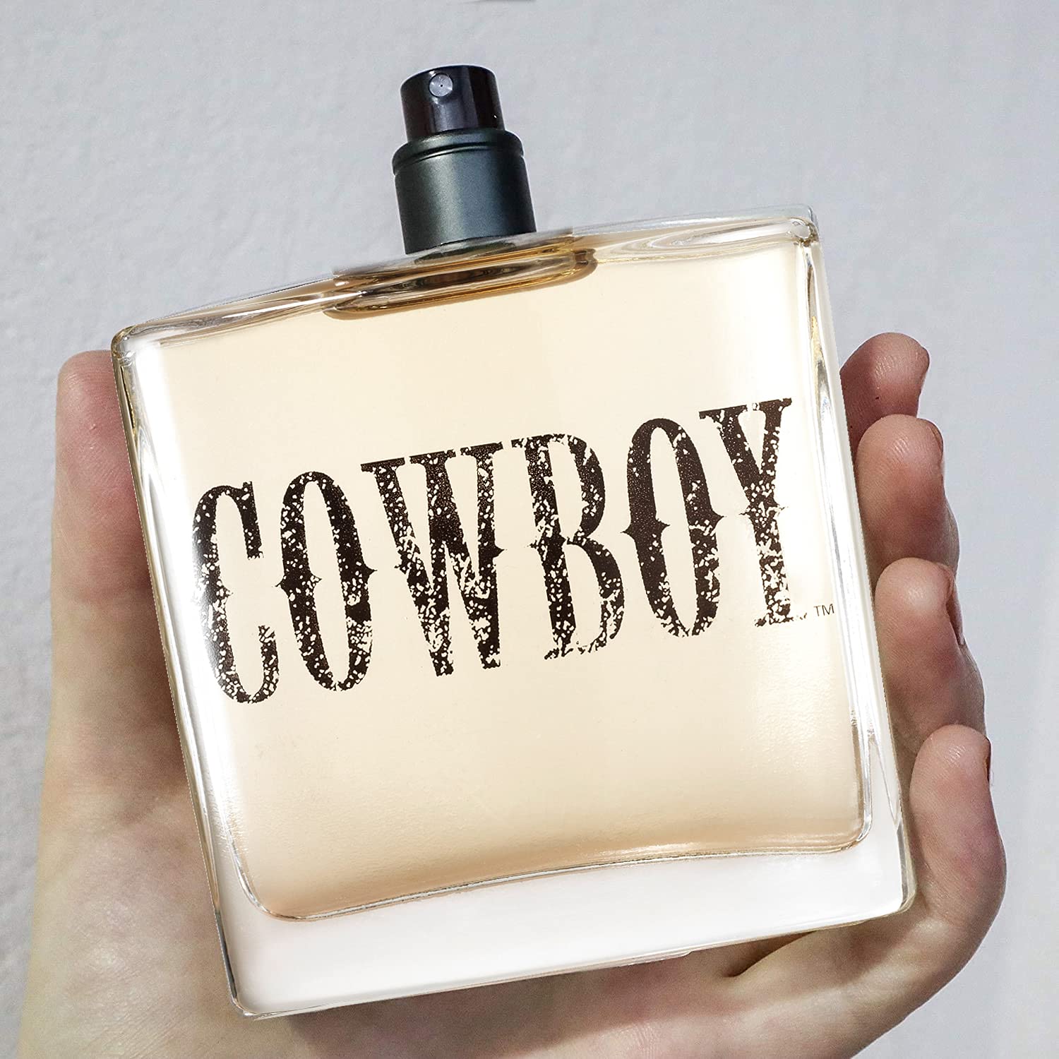 Tru Western Cowboy Cologne label closeup featuring juniper and sage notes.