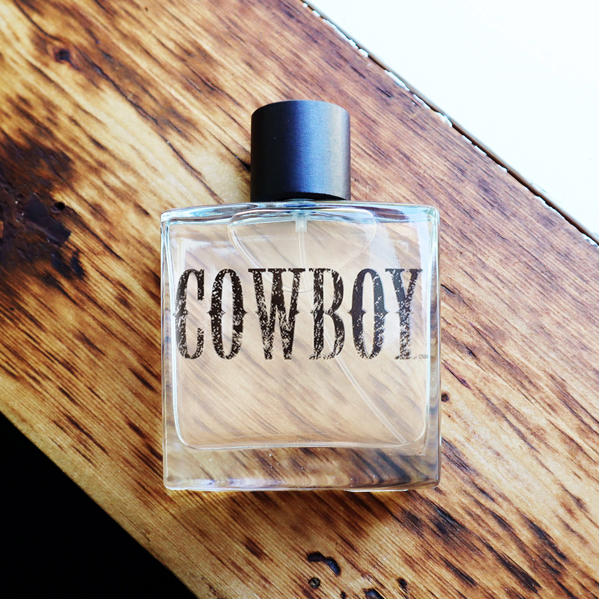 Tru Western Cowboy Cologne scent profile image highlighting moss and mahogany woods.
