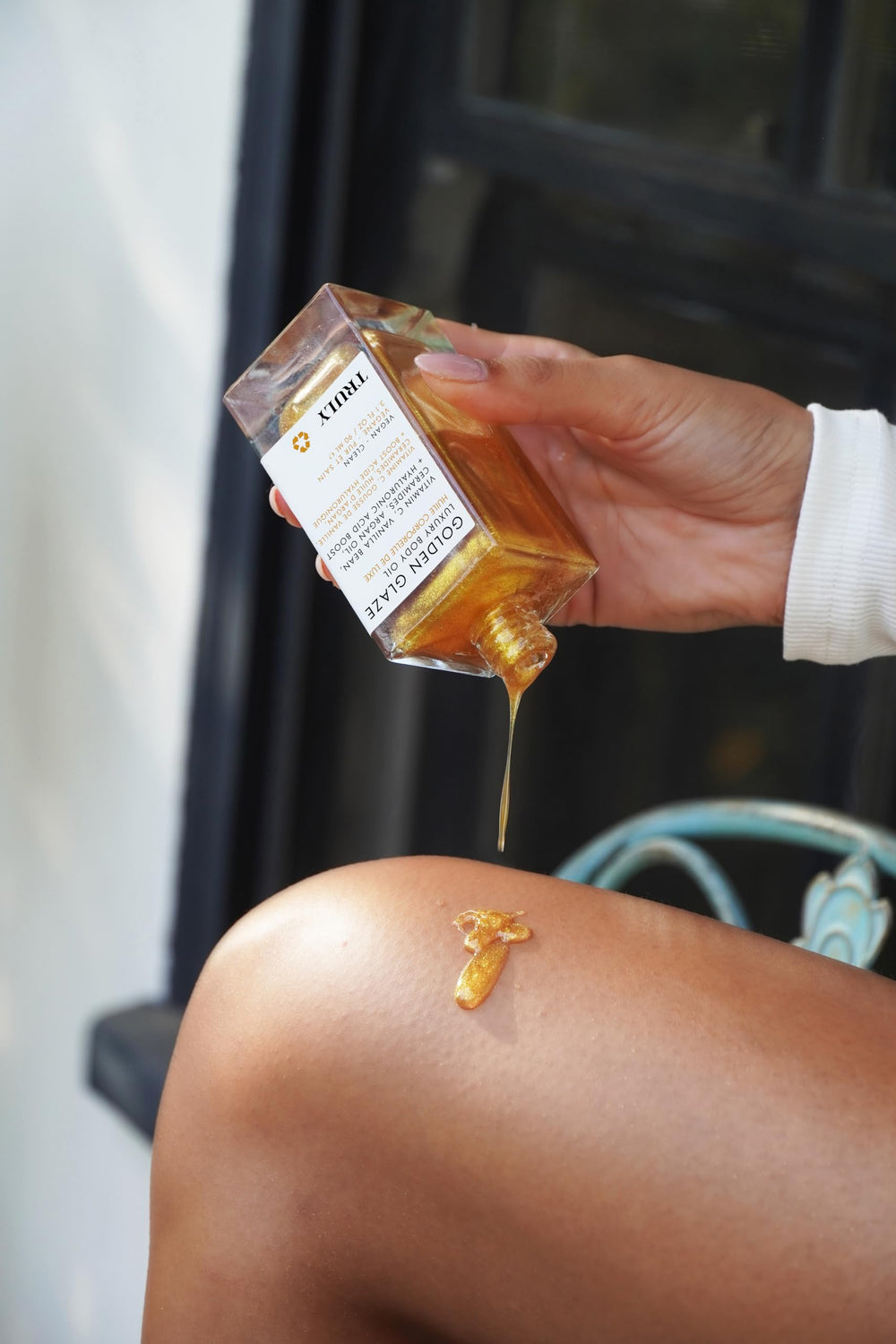 Truly Beauty Golden Glaze application-on-arm demonstrates quick, lightweight absorption.