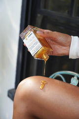 Truly Beauty Golden Glaze application-on-arm demonstrates quick, lightweight absorption.