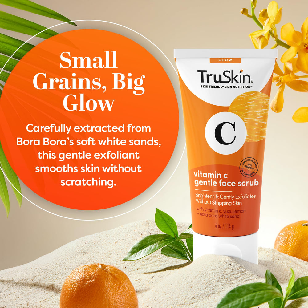 truskin vitamin c gentle face scrub being massaged on cheek for gentle exfoliation.