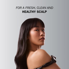 TRUSS Therapy scalp massage application demonstrates gentle cleansing for flakes
