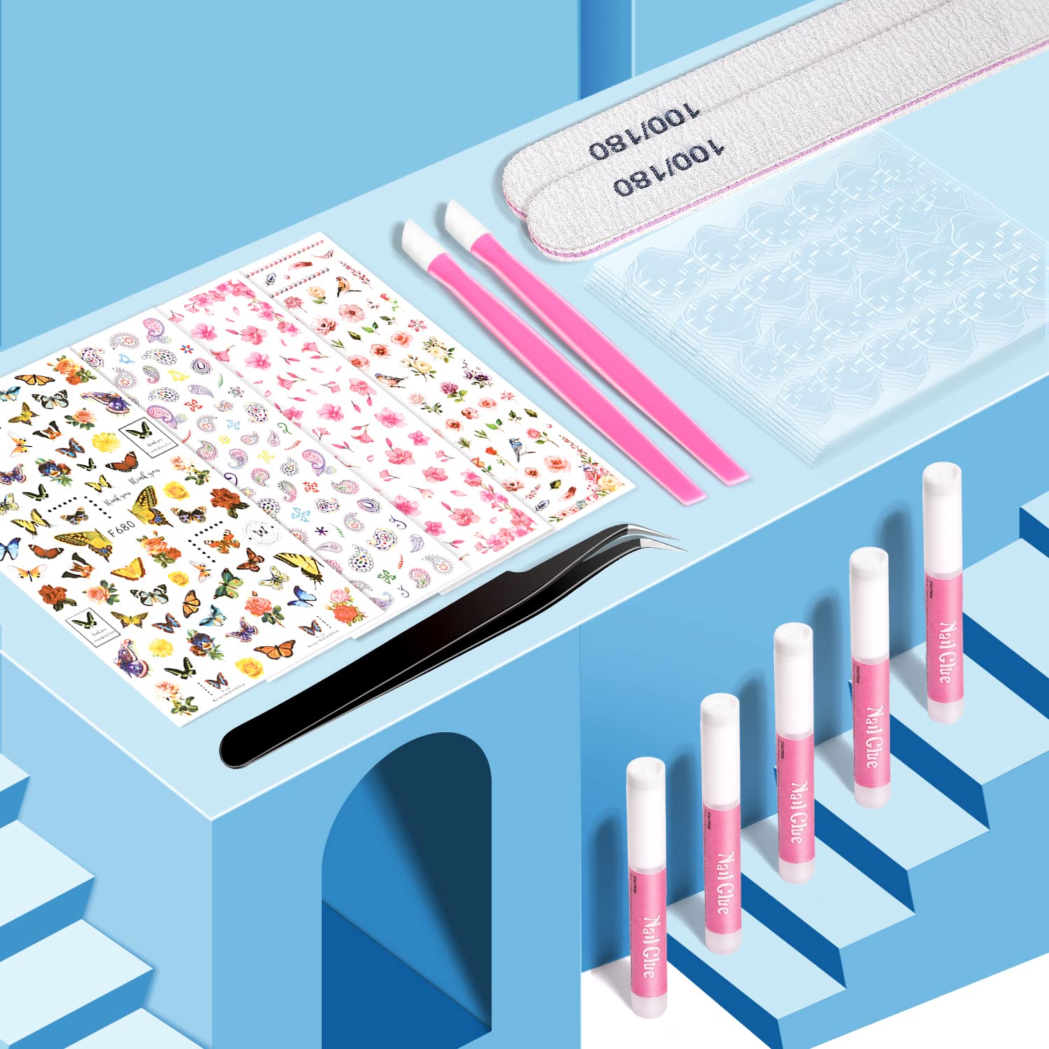TsMADDTs pickup tweezer for precise nail art placement.