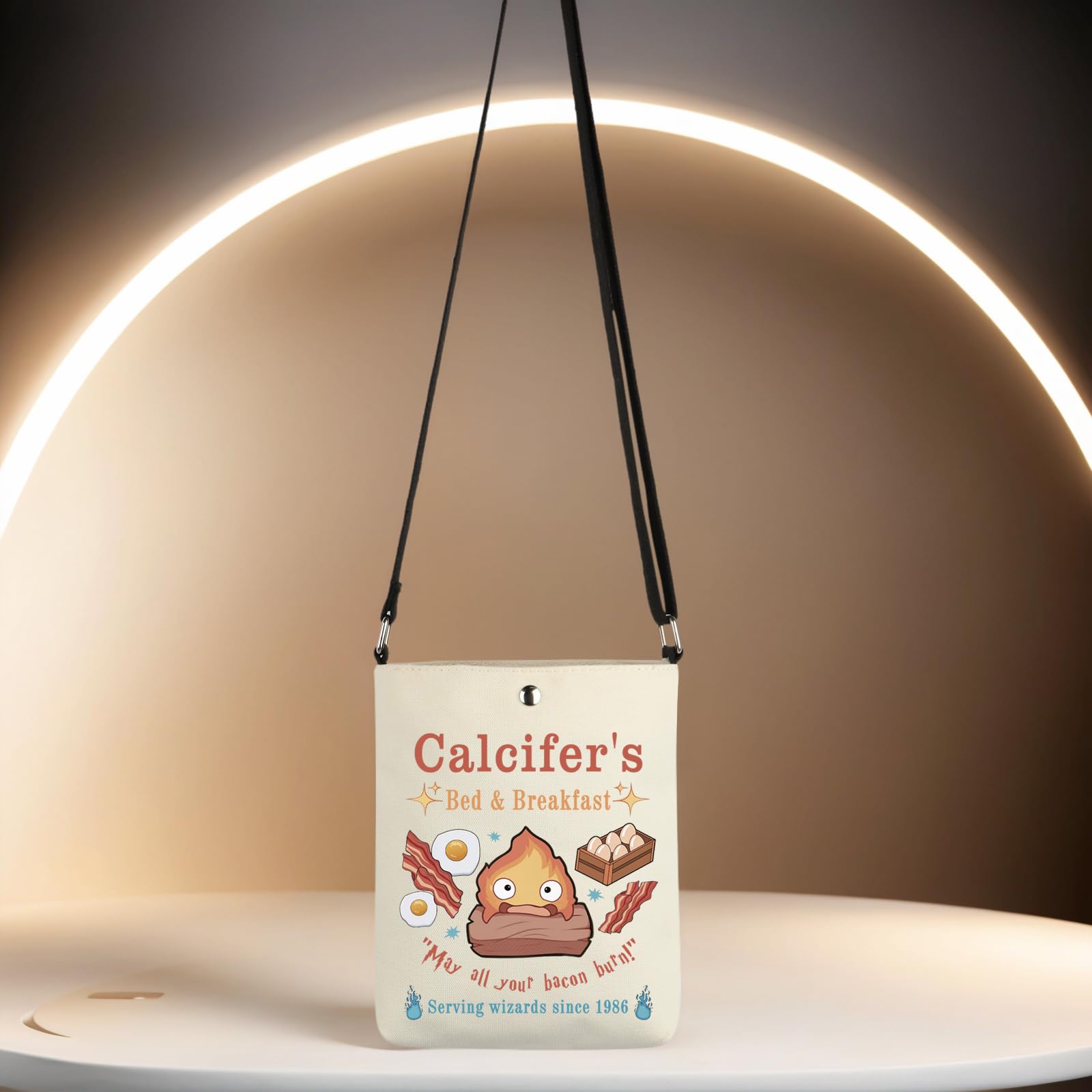TSOTMO Calcifer's CR crossbody bag strap and wrist-strap option for convenience