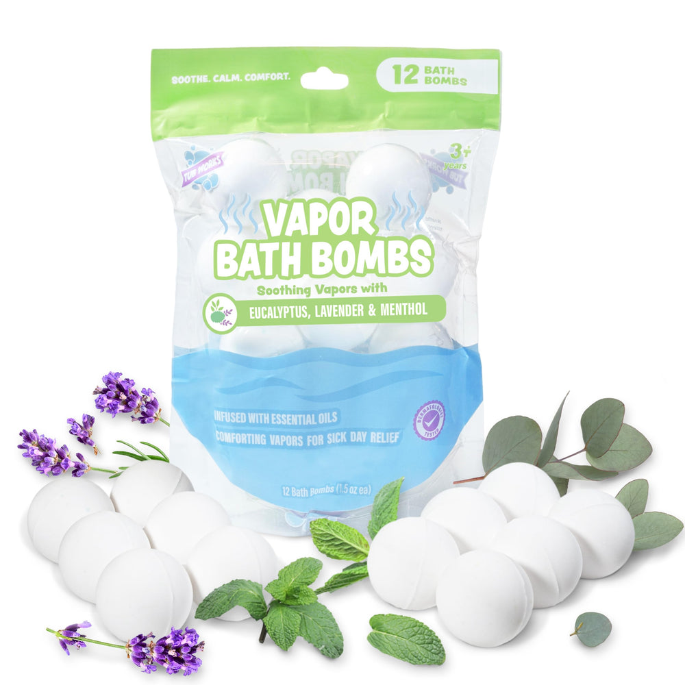 Tub Works vapor bath bombs for kids dissolving in warm water for comfort.