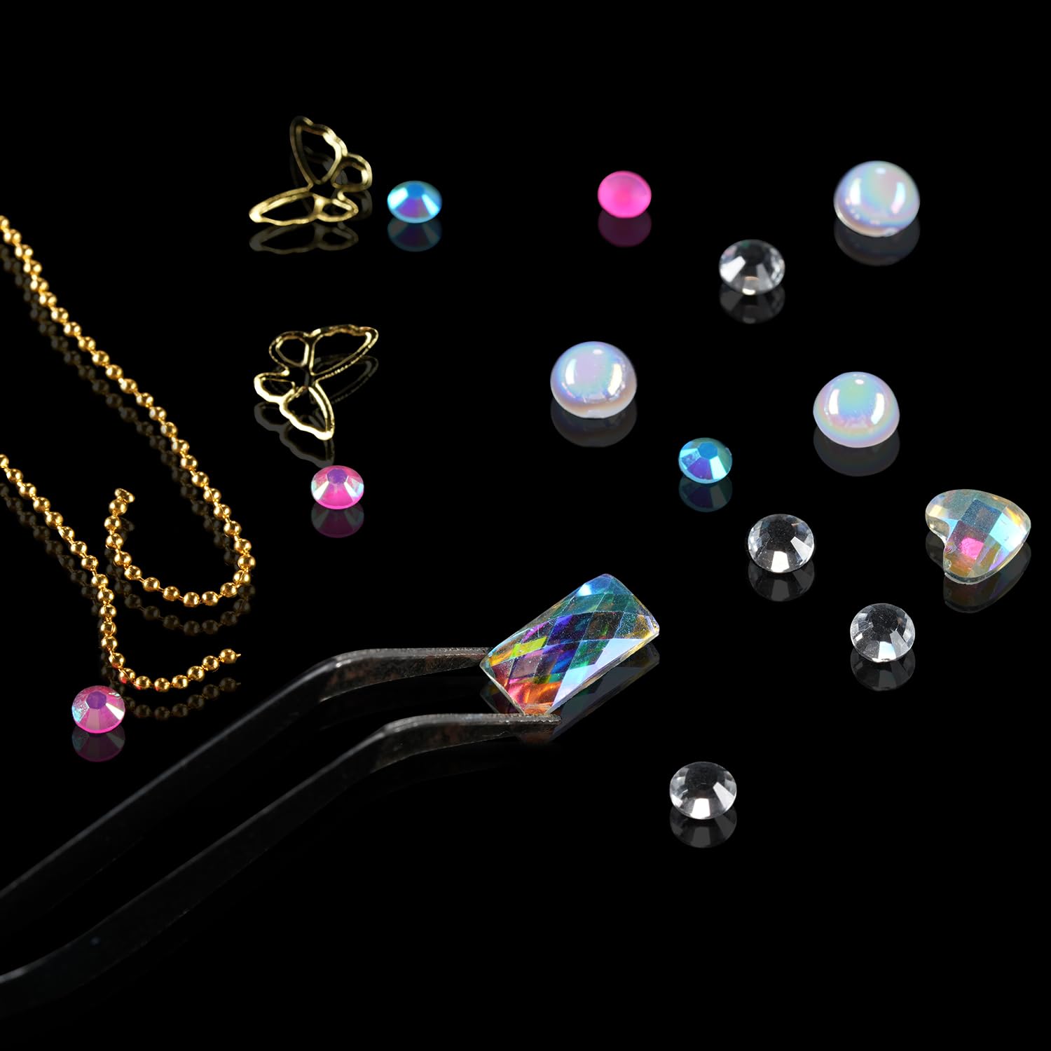 Tucepu gold and silver studs with chains elevate luxe details.