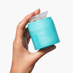 Texture close-up of TULA Bright Start moisturizer showing a gel-cream consistency.