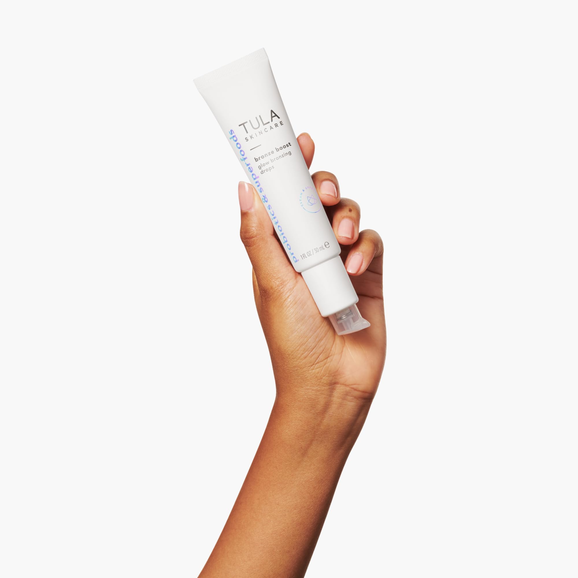 TULA Bronze Drops on hand demonstrates sheer application for sun-kissed radiance