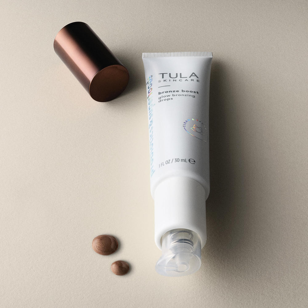 TULA Bronze Drops warm-tone gleam on cheek highlights glow from within
