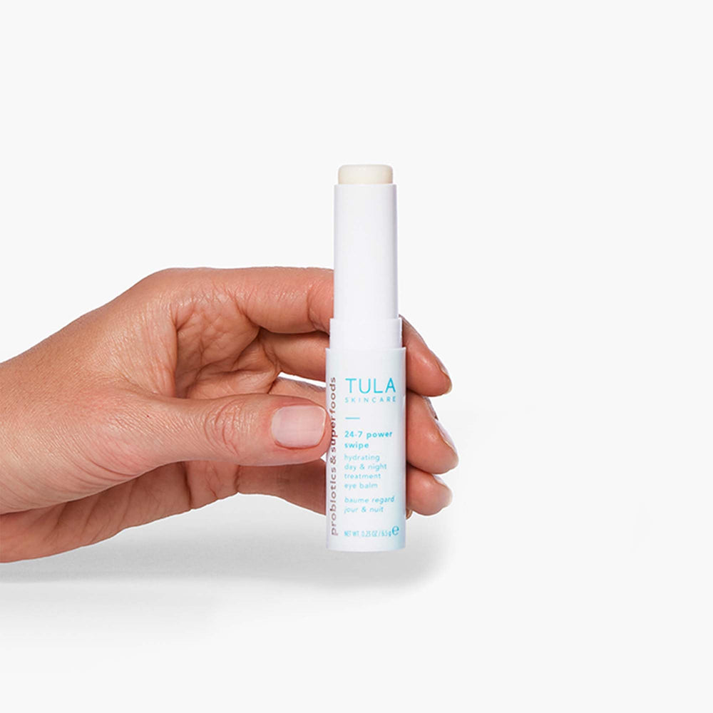TULA eye balm packaging front highlights portable 0.23oz size for on-the-go care.