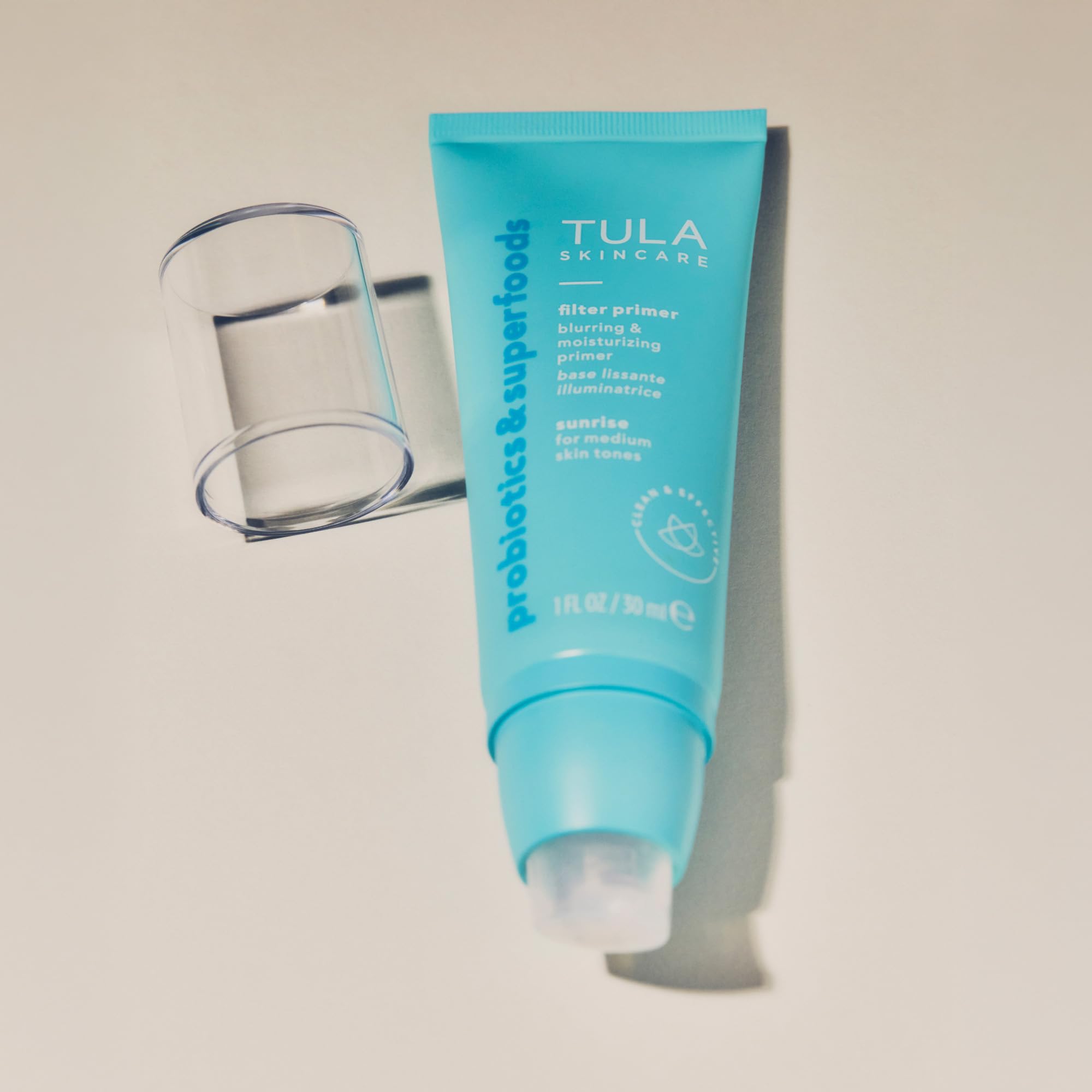 TULA Sunrise primer helps soften redness for balanced tone.