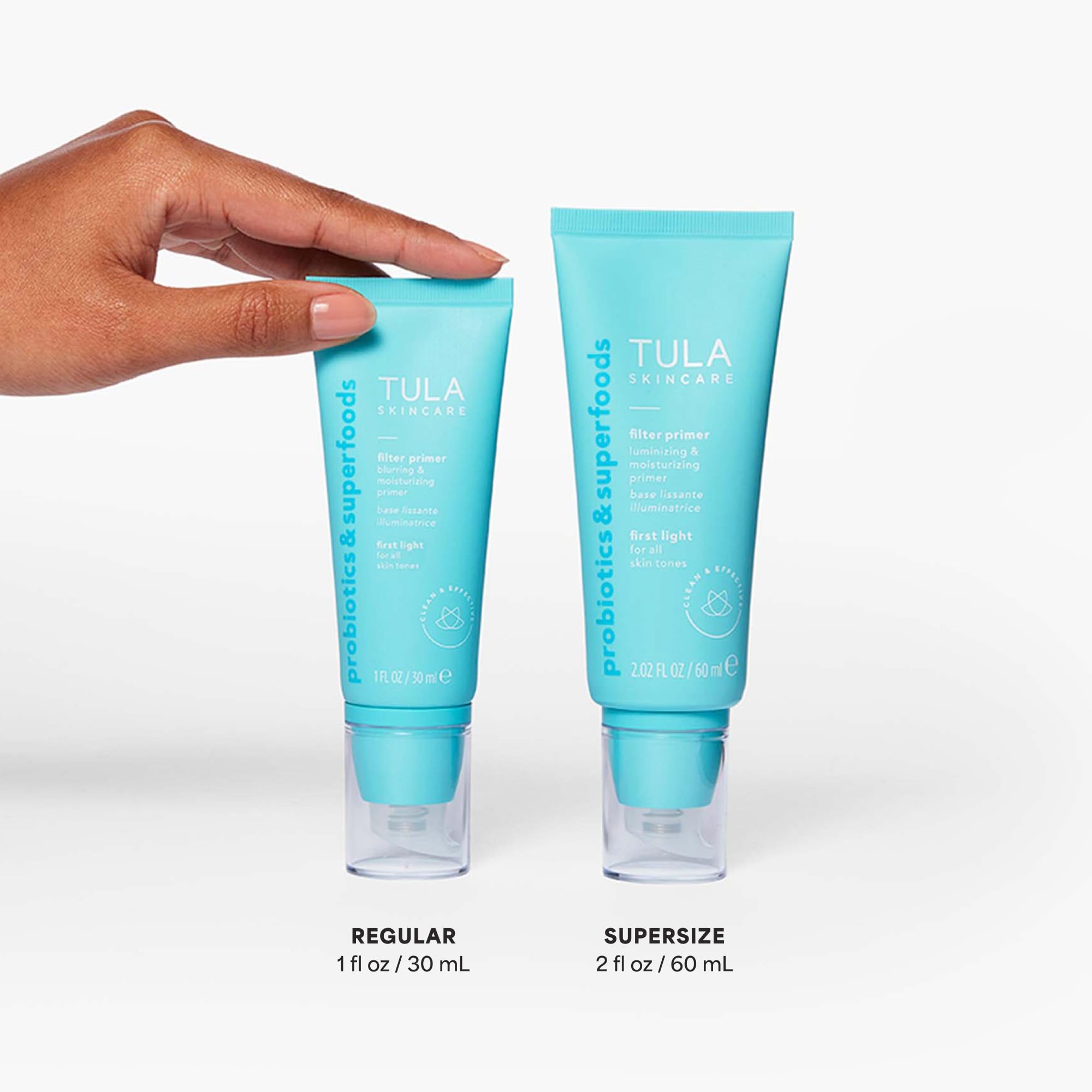 TULA First Light primer applied to forehead for a smooth makeup base.