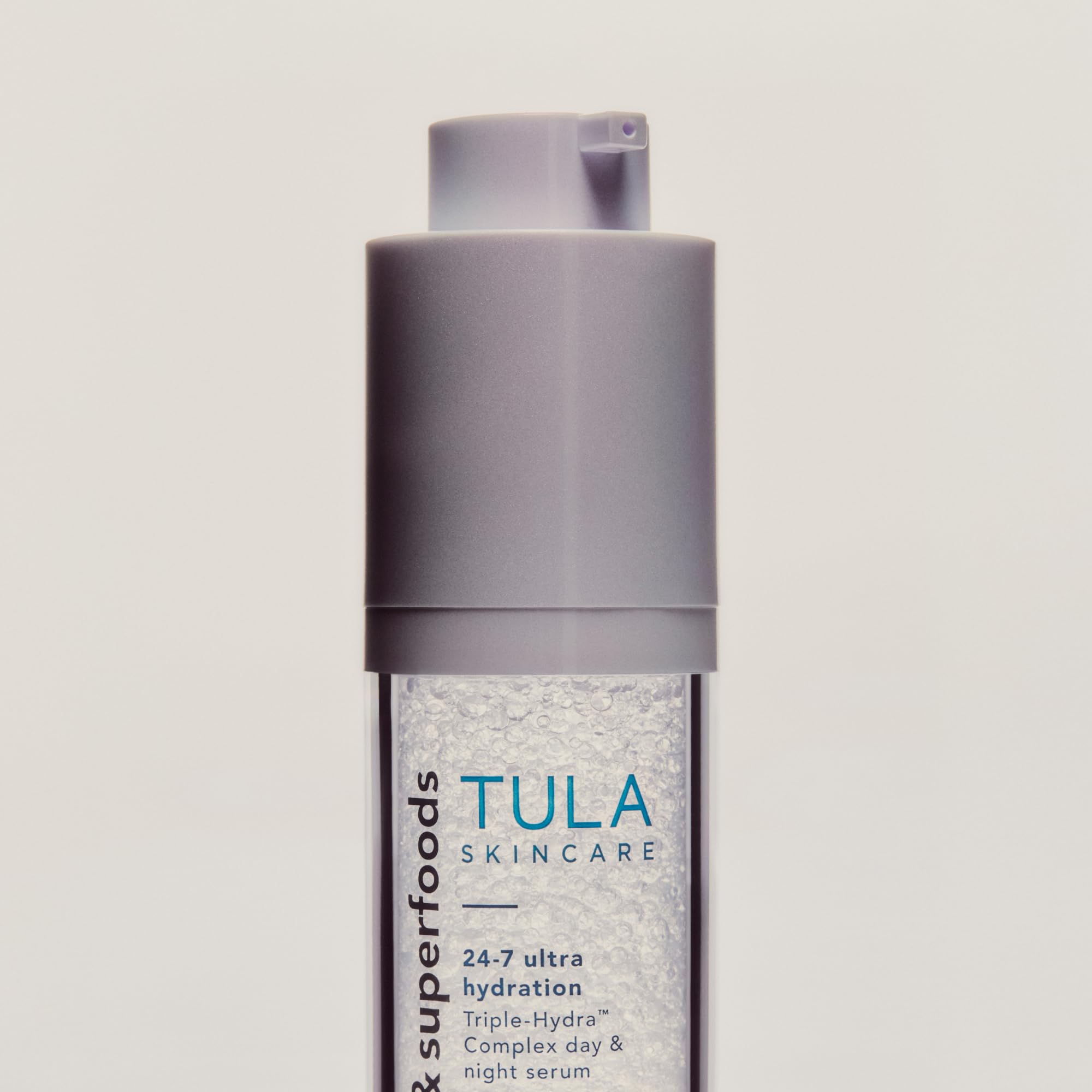 TULA serum application showing moisture transfer to skin